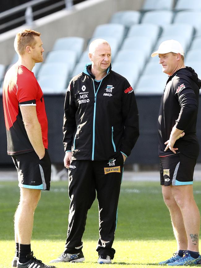 Aaron Greaves, Ken Hinkley and Michael Voss in discussion at Port training. Picture Sarah Reed