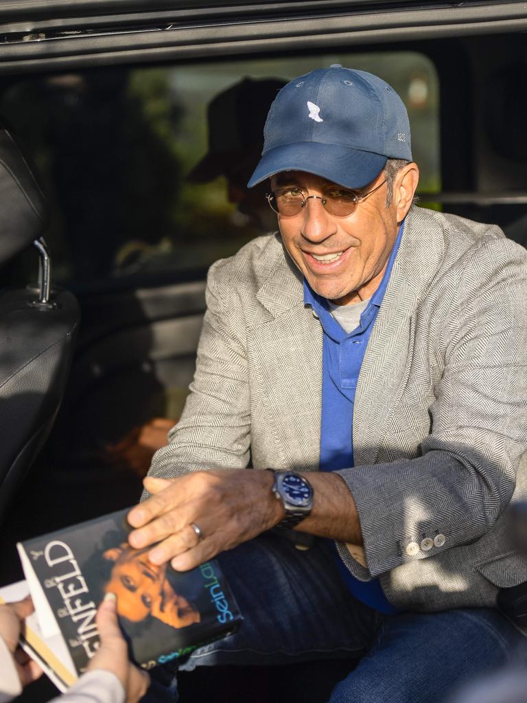 Upon his arrival, Seinfeld gave autographs to fan. Picture: NewsWire/Roy VanDerVegt