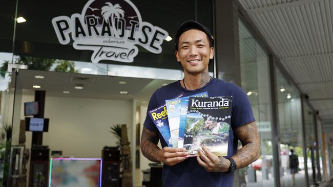 Paradise Adventure Travel has opened its doors at the corner of Lake and Shields Streets, where Rockmans used to be located. Owner Joseph Kim will sell tours along the east coast, as well as original artworks from his store. Picture: Brendan Radke