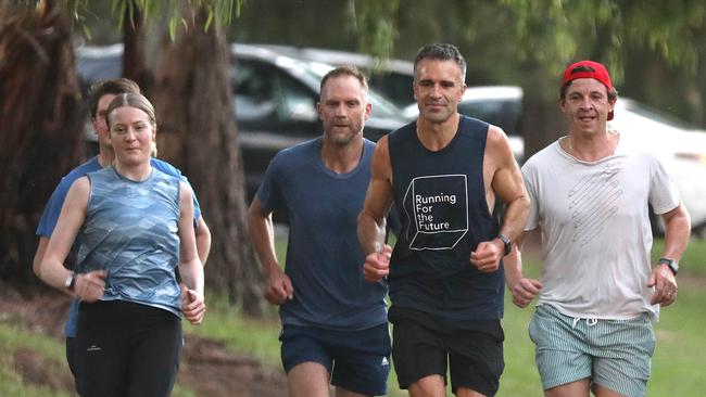 Labor Leader Peter Malinauskas running along the Torrens riverbank on February 23. Picture Dean Martin