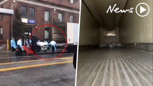 Coronavirus: Disturbing footage shows truck 'loading bodies' outside New York hospital