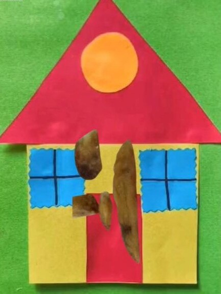 A paper house with chips stuck to it, from Mr Howe’s video. Picture: @jameshowestudio on Instagram