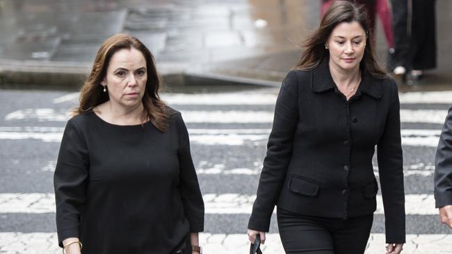 Former Super Retail executive Rebecca Farrell (L) and Amelia Berczelly (R) pictured walking to Federal Court in Sydney in August. Picture: NewsWire / Monique Harmer