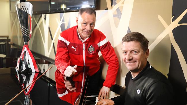 Damian Mori (R) and Joe Mullen tinkling the ivories over breakfast before in the lead up to the 2018 NPL grand final at Hindmarsh. (AAP Image/Dean Martin)