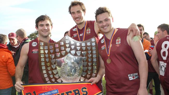 Will Hugo, Will Dalwood and Hayden Jolly after the 2016 grand final. Picture: Stephen Laffer