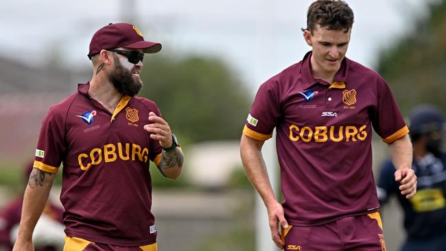 Coburg captain Aaron Shellie (left) speaks to Jacob Carruthers. Picture: Andy Brownbill