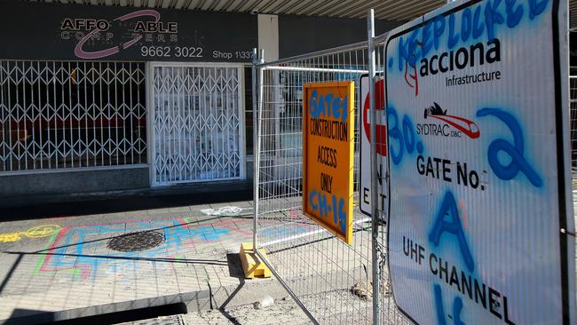 Light Rail construction fencing outside a closed shop at 337 Anzac Parade in Kingsford. Picture: Toby Zerna