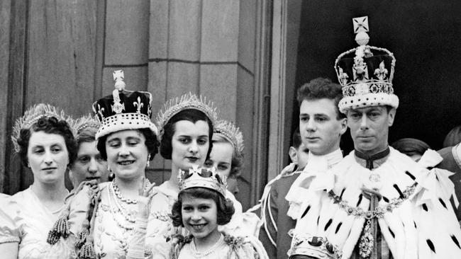 Queen Elizabeth (2nd-L, future Queen Mother), her daughter Princess Elizabeth (4th-L, future Queen Elizabeth II), Queen Mary (C) , Princess Margaret (5th-L) and the King George VI (R), pose at the balcony of the Buckingham Palace on May 12, 1937. Picture: Central Press