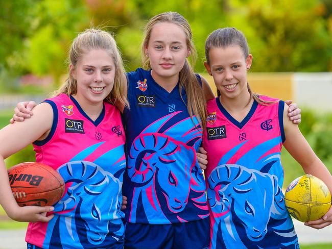 Glenunga footballers Lucy, Lucinda and Scarlett at the start of this season. Picture: AAP/Roy Vandervegt