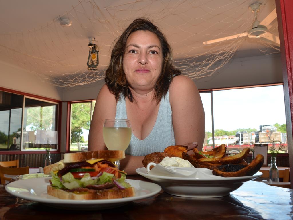 Priscilla Meli in the bistro area with some of their new dishes after taking over the pub in 2023. Ms Meli said she always keeps casserole in the fridge for truckies needing a feed outside kitchen hours.