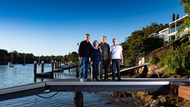 Waterfront Action Group members Gerry Manderson, Anne and Peter Massasso and George Citer on a private jetty near Glades Bay Park. Picture: Monique Harmer