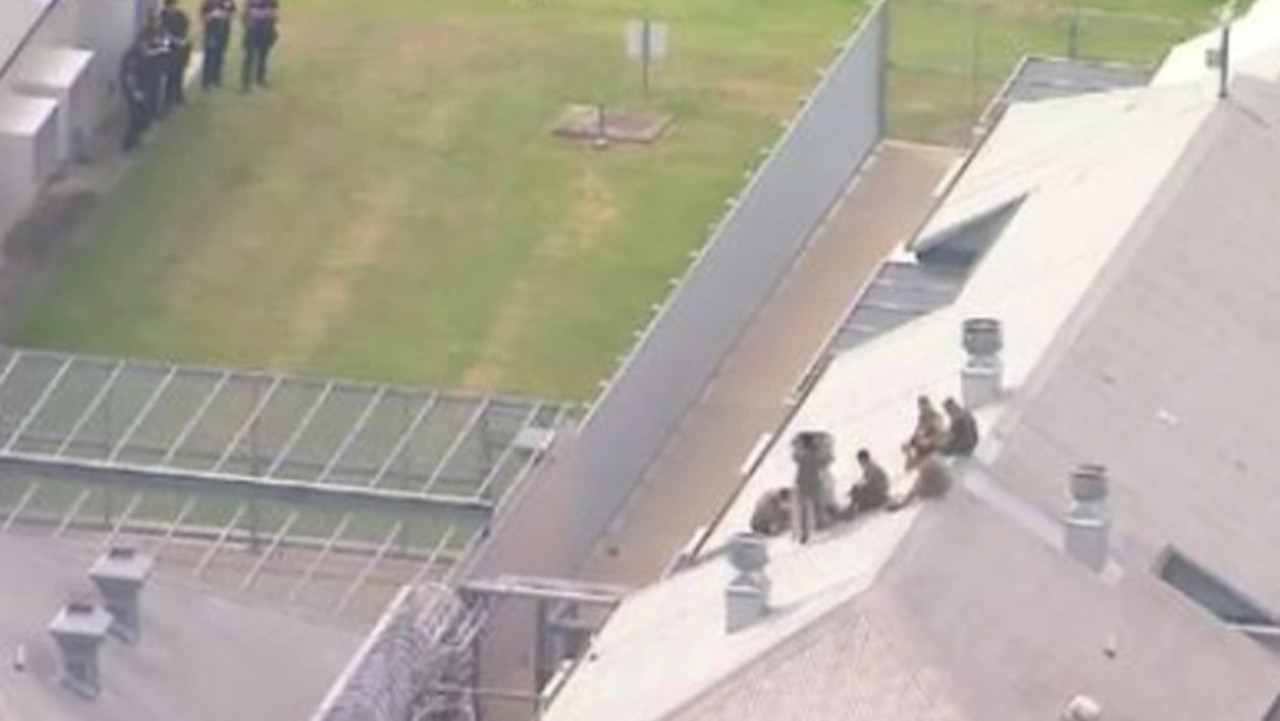 Prisoners on the roof of a building at Borallon Correctional Centre west of Brisbane. Picture: 9 News Queensland/Twitter.