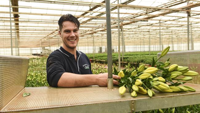 Luke de Wit has taken over his family business Burleigh Flowers. Photo: Dannika Bonser