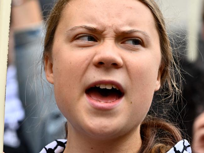 Swedish climate activist Greta Thunberg, wearing a checkered head scarf (kaffiyeh or keffiyeh), takes part in a demonstration organised by forty Swedish social justice movements under the message 