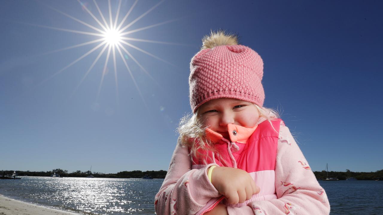 Raffi Smith-Rogers, 5, rugs up against the cold at Noosaville. Picture Lachie Millard