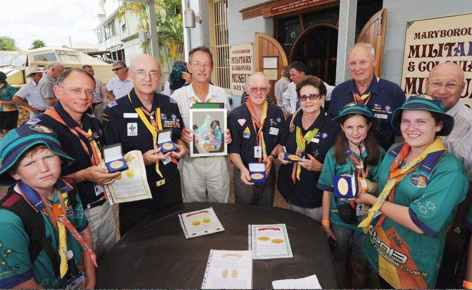 Scouting dignitaries and junior scouts pose with the medal collection presented to museum curator John Meyers (centre) at the Military and Colonial Museum. Picture: Robyne Cuerel