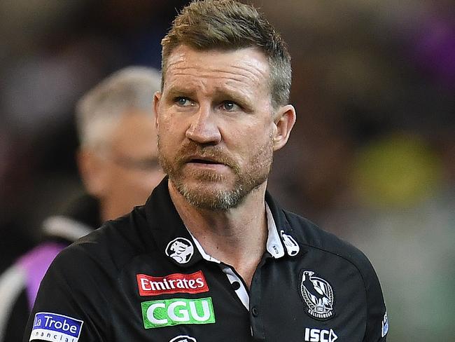 Magpies coach Nathan Buckley is seen during the Round 11 AFL match between the Collingwood Magpies and the Fremantle Dockers at the MCG in Melbourne, Sunday, June 3, 2018. (AAP Image/Julian Smith) NO ARCHIVING, EDITORIAL USE ONLY