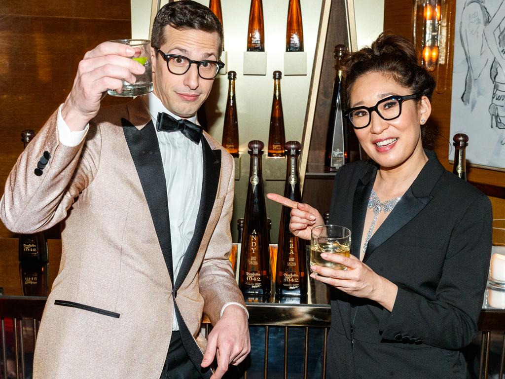 Andy Samberg and Sandra Oh celebrated with tequila at their private Golden Globes after-party. Picture: Getty Images