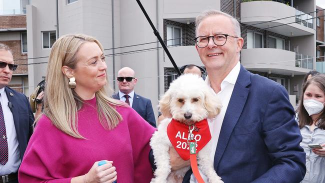 FEDERAL ELECTION TEAM 2022. LABOR BUS TOUR 21/5/22Federal Labor leader Anthony Albanese arrives at Marrickville Library in the seat of Barton with partner Jodie Haydon,  son Nathan and dog Toto to cast his vote on Election Day.   Anthony  addresses media for the last time until tonight. Picture: Sam Ruttyn