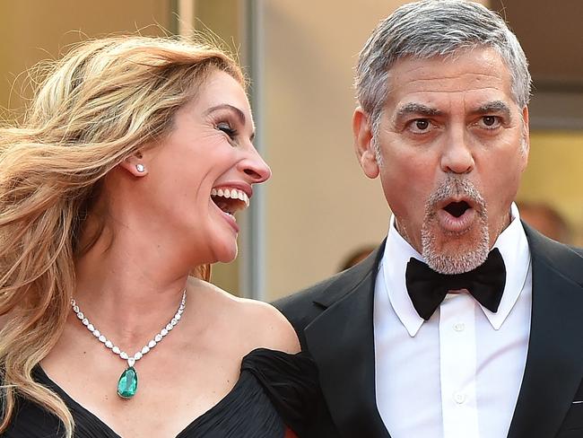 Julia Roberts says she will tease George Clooney about her People magazine title.  Picture:  AFP