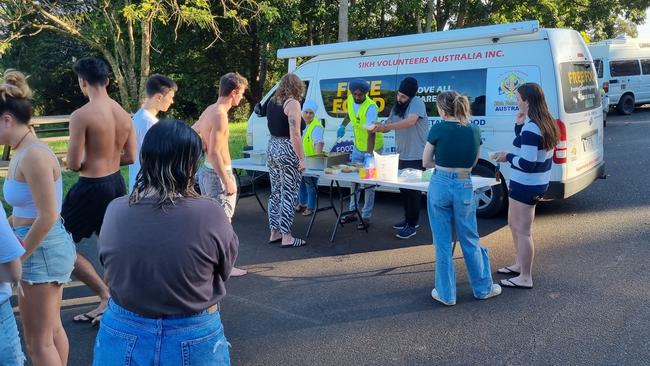 The Sikh community providing aid to those in dire need at Lismore. Picture: Jaswinder Singh