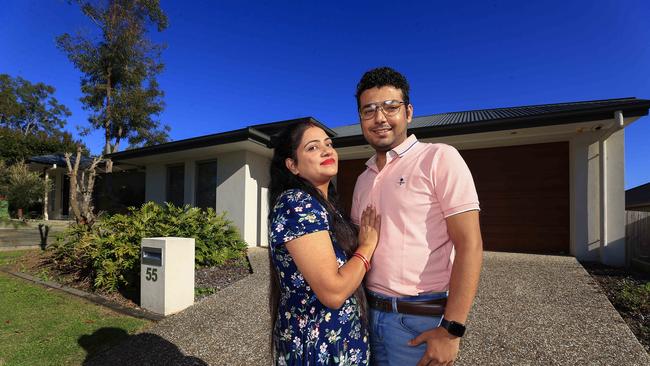 Investor Arvinder Singh and  Aman GABA have gone into the investment market to get ahead for their family. Seen with their Yarrabilba property.