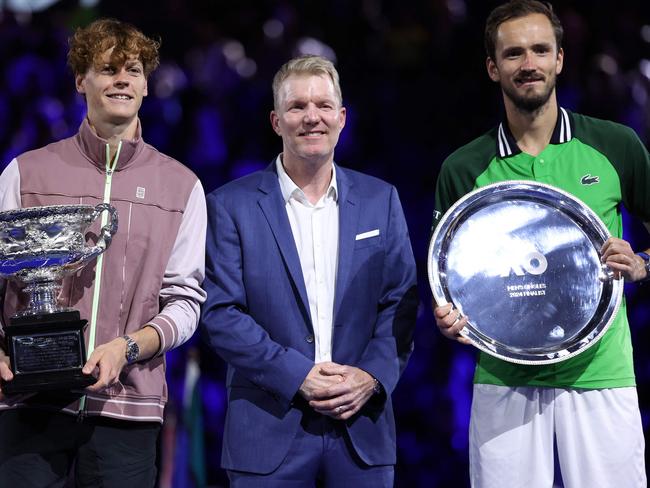 Jannik Sinner and Daniil Medvedev with Jim Courier. Picture: AFP