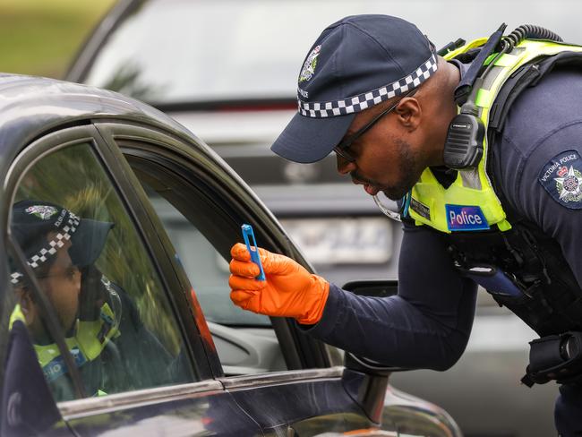 MELBOURNE, AUSTRALIA - NewsWire Photos DECEMBER 23, 2022 : Victoria Police pull over drivers at a roadside drug and alcohol testing site in Southbank, as part of Operation Roadwise in the lead up to Christmas. Picture NCA NewsWire / Ian Currie