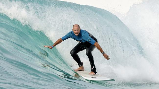 Geelong great Michael Turner has been unable to get into the water for the better part of a year as he battled pancreatic cancer, but is hoping to be back on board by Christmas.