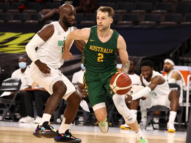 LAS VEGAS, NV - JULY 13: Nathan Sobey #2 of the Australia Men's National Team drives to the basket against the Nigeria Men's National Team on July 13, 2021 Michelob ULTRA Arena in Las Vegas, Nevada. NOTE TO USER: User expressly acknowledges and agrees that, by downloading and or using this Photograph, user is consenting to the terms and conditions of the Getty Images License Agreement. Mandatory Copyright Notice: Copyright 2021 NBAE (Photo by Stephen Gosling/NBAE via Getty Images)