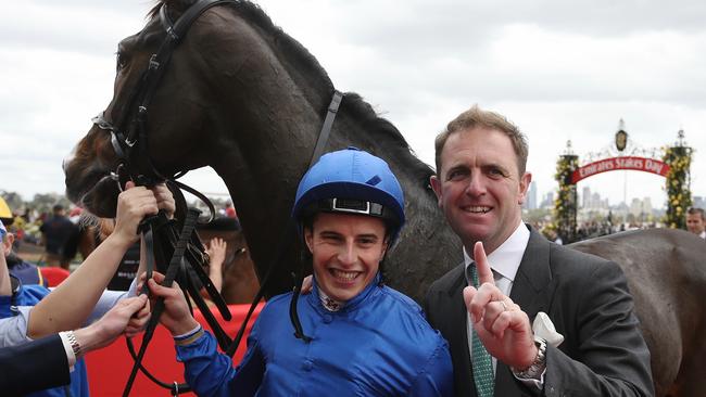 Jockey William Buick and trainer Charlie Appleby celebrate after Francis of Assisi won last year’s Queen Elizabeth Stakes. Picture: Wayne Ludbey