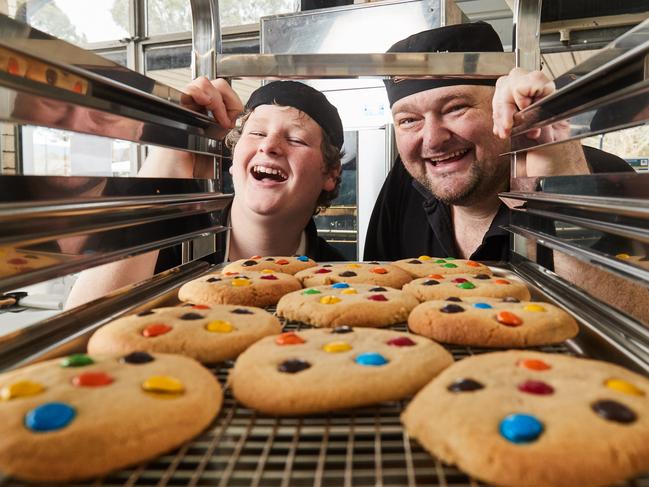 Daniel-Jack, 12, with his dad Daniel Forrester at Marden Senior College Cafe. Ten percent of their profit goes to Autism SA. Picture: Matt Loxton