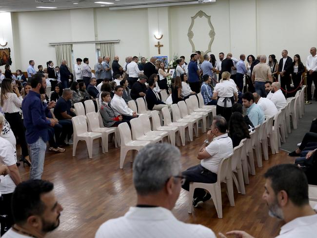 People arrive to offer condolences to Danny and Leila Abdallah. Picture: Damian Shaw