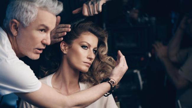 Fashionable style ... behind the scenes with Baz Luhrmann and Gisele Bundchen for Chanel No. 5. Picture: Hugh Stewart/Chanel
