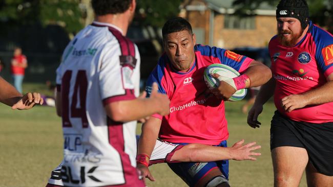 GCDRU (Gold Coast Rugby) first grade clash between Helensvale Hogs (pink) and Nerang Bulls. (white). Whitney Ueta-Siteine. Pic Mike Batterham