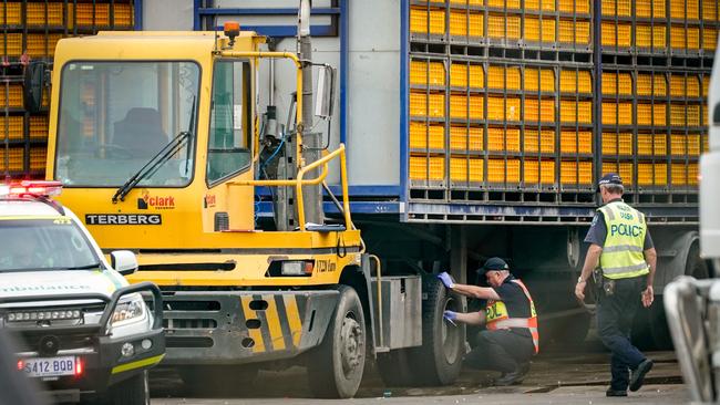 Police examine a truck after a pedestrian was stuck at the Ingham’s chicken factory on Burton Rd, Burton on Monday. Picture: Mike Burton