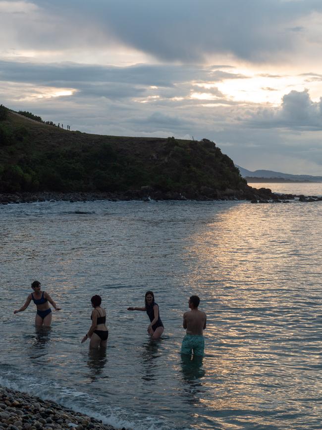 Wild Wellness Method Cove retreat guests take a refreshing dip in the ocean. Picture: Chris Crerar