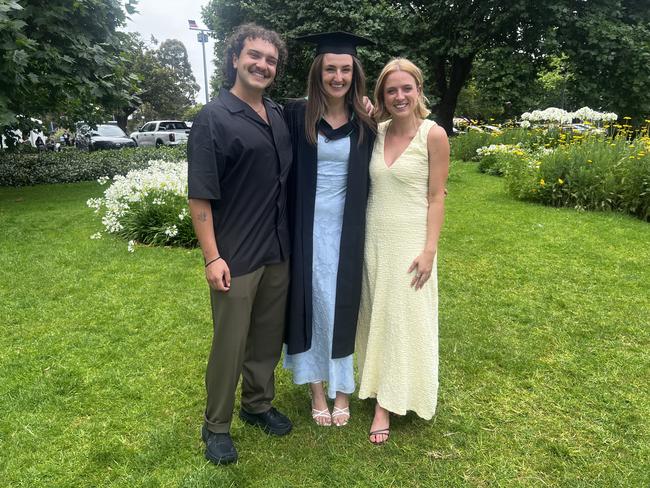 Ryley Duncan, Emily Metcalfe (Master of Teaching (Secondary Education)) and Bre Savage at the University of Melbourne graduations held at the Royal Exhibition Building on Saturday, December 14, 2024. Picture: Jack Colantuono