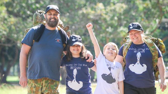 Ms Eveleigh is known throughout the community for her work with the charity Walking Off The War Within. Here she is with her partner Ashley Jones and their kids Amelia and Sebastian. Picture: Glenn Campbell