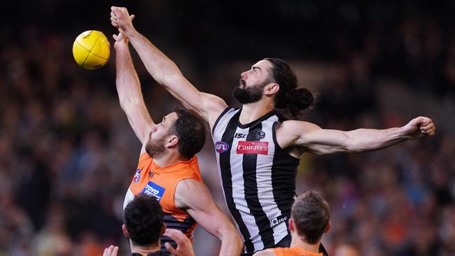 Shane Mumford and Brodie Grundy compete in a ruck contest in the preliminary final.