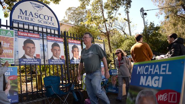 Supporters and voters at Mascot Public School for the Local Government Elections.