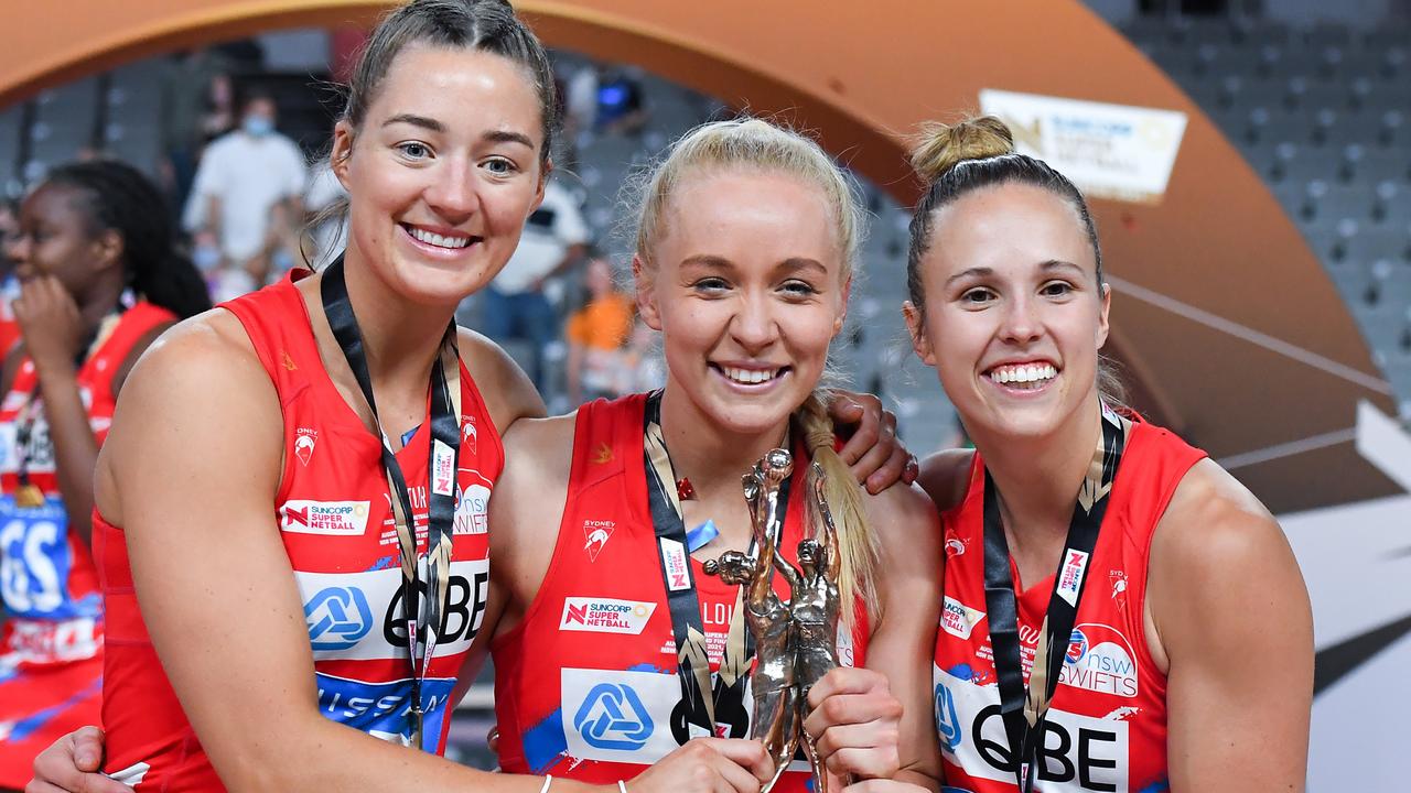 Tayla Fraser (centre) celebrates her second Super Netball premiership win with teammates Lauren Moore (left) and Paige Hadley. Picture: Getty Images