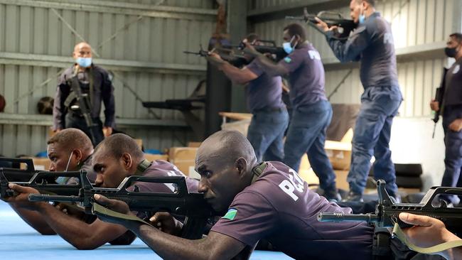 China Police Liason Team officers train Royal Solomon Islands Police Force officers in 2022. Picture: RSIPF/AFP