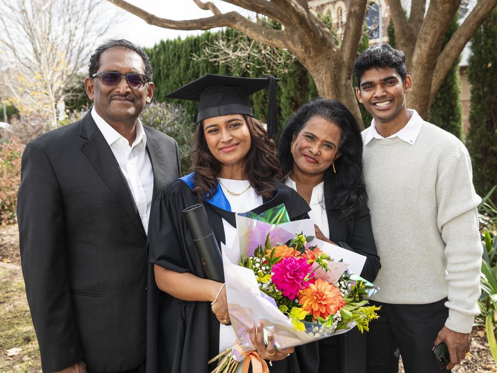 Valedictorian and Master of Clinical Psychology graduate Shameta Siva with dad Sivagurunathan, mum Rus Mary Alphonse and brother Jignesh Siva at a UniSQ graduation ceremony at The Empire, Tuesday, June 25, 2024. Picture: Kevin Farmer