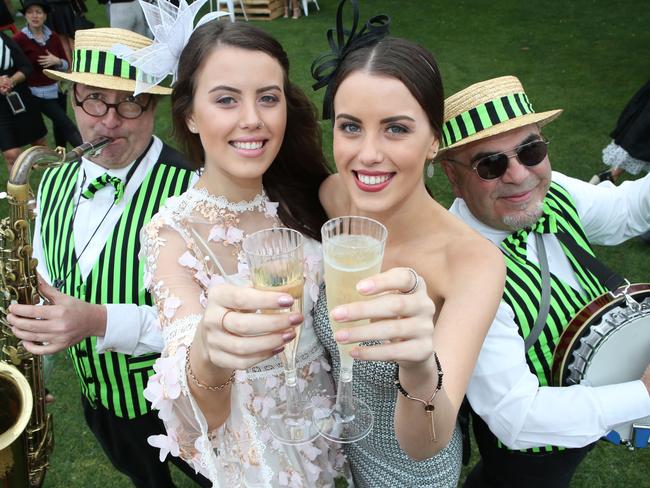 Geelong twins Taylah and Alannah Matchett with Jason Chalmers and Robert Severini of the Dixie Dukes. Picture: Glenn Ferguson