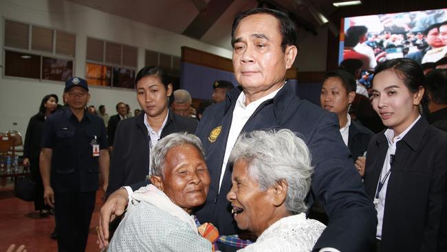 Thai Prime Minister Prayuth Chan-ocha with voters in Nakhon Ratchasima. Picture: AP 