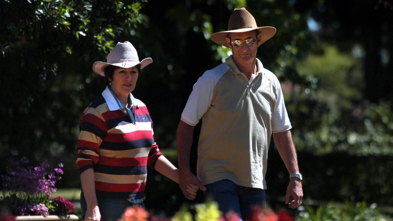 NewsBCM15-09-2005 Toowoomba Carnival of Flowers is still going ahead despite the Level 4 Water Restricition – Lyn and Keith Christie of Mt Isa are enjoying the colours among the flowerbeds in Queens Park. Picture: David Martinelli.