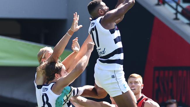 MELBOURNE.  19/03/2022.   AFL. Round 1.  Geelong vs Essendon at the MCG .   Esava Ratugolea of the Cats takes a big 1st qtr mark . Photo by Michael Klein