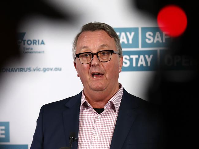 MELBOURNE, AUSTRALIA - MAY 24: Health Minister Martin Foley speaks to the media on May 24, 2021 in Melbourne, Australia. Victorian health officials are investigating the source of two positive COVID-19 cases in Melbourne. The new cases have sparked concerns there may have been undetected coronavirus transmission in Victoria, with the positive case recorded in the state several weeks ago.   (Photo by Darrian Traynor/Getty Images)