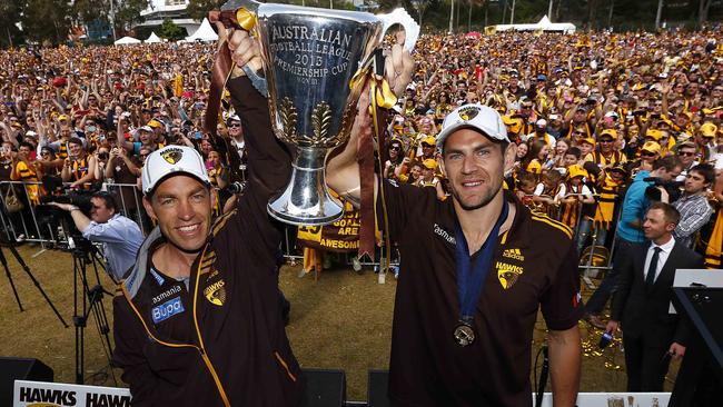 Alastair Clarkson and Luke Hodge with the 2013 premiership cup. Picture: Michael Klein